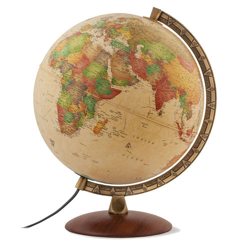 Antique desktop globe against a white background.